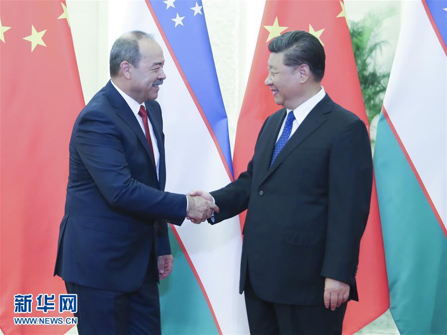 (时政)习近平会见乌兹别克斯坦总理阿里波夫
